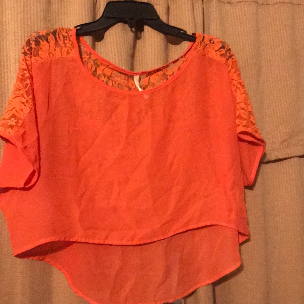 Orange crop top with lace. Worn once